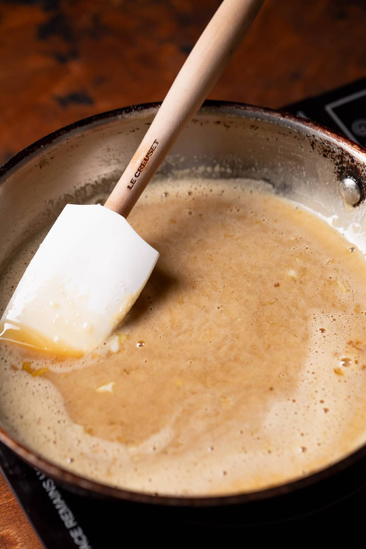 A pan with the pecan filling cooking.