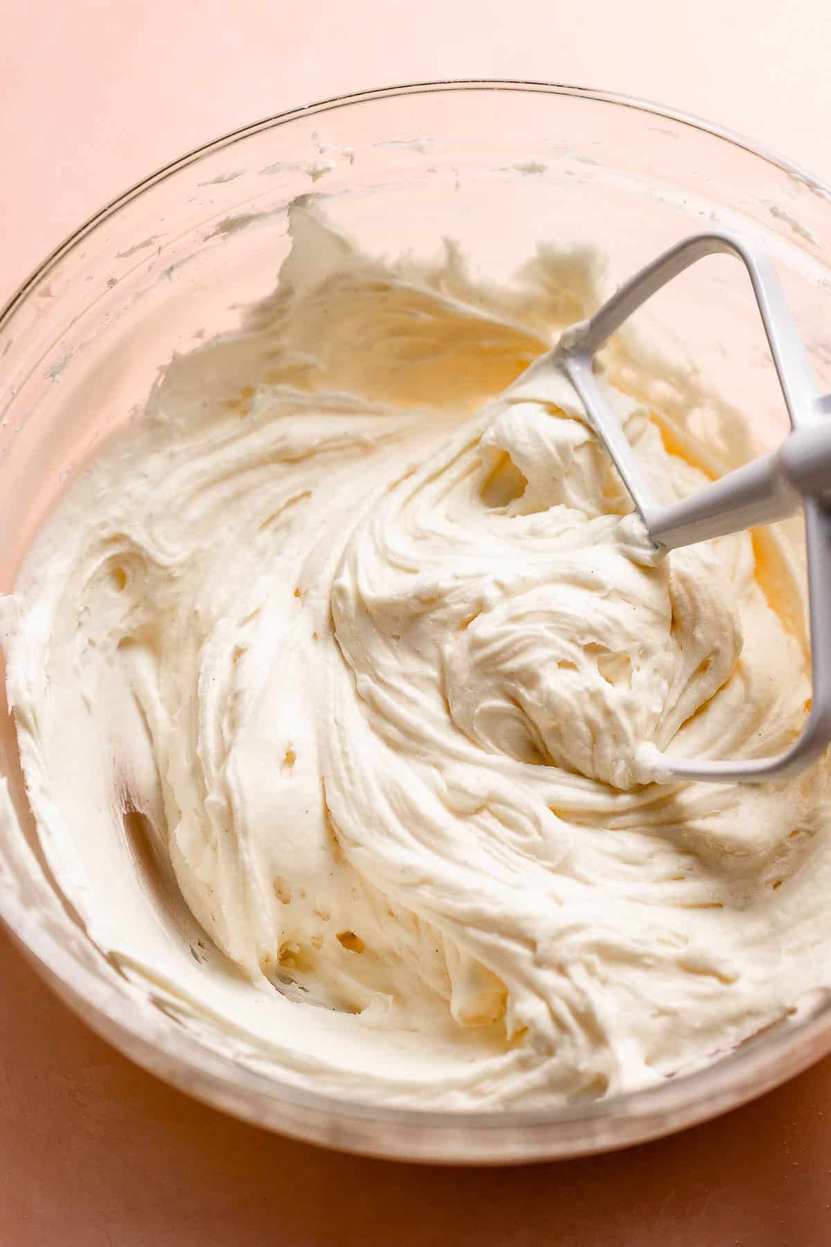 Lemon cream cheese frosting in a bowl.