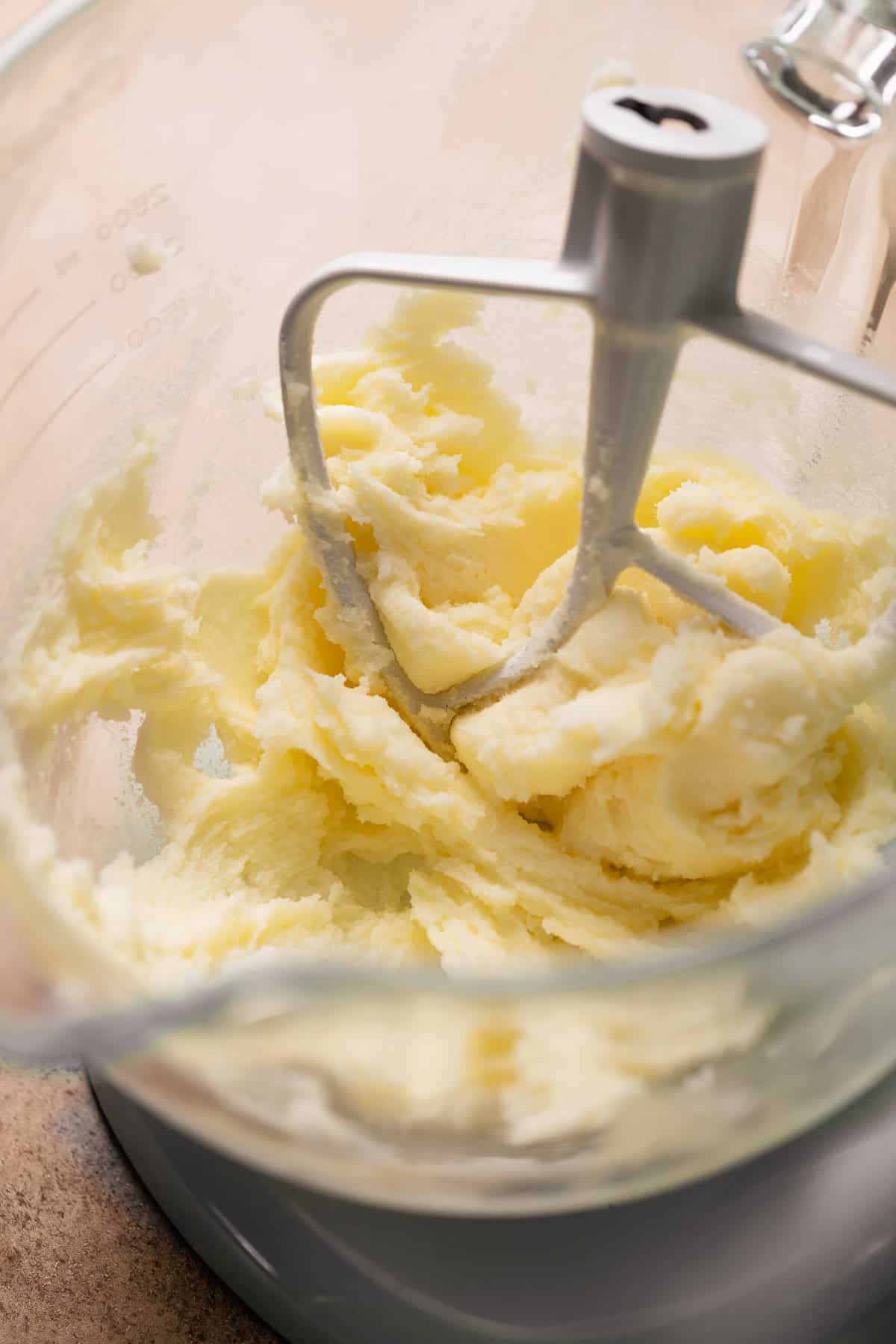 Creamed butter and sugar in a mixing bowl.