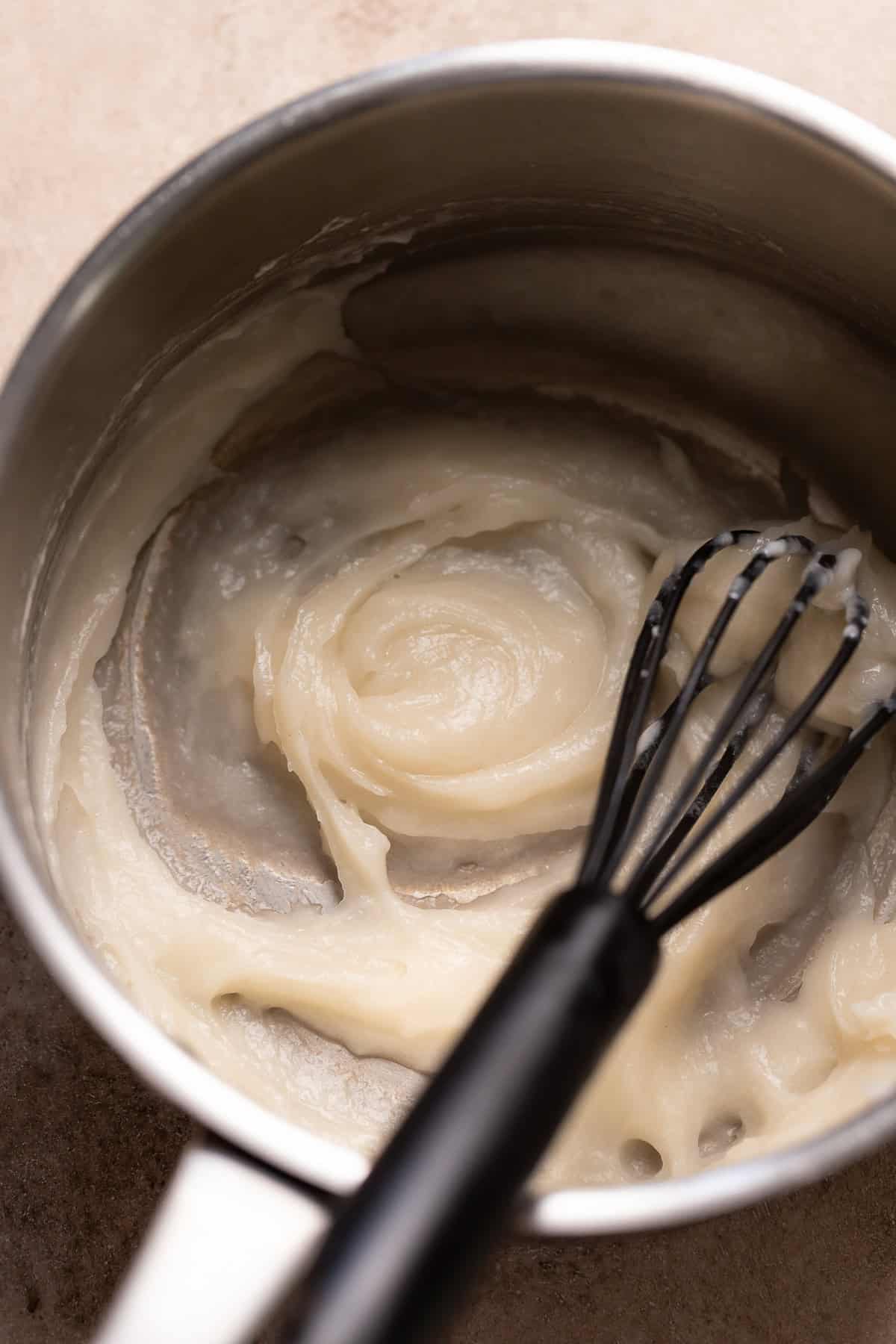 Tangzhong in a pot being whisked.