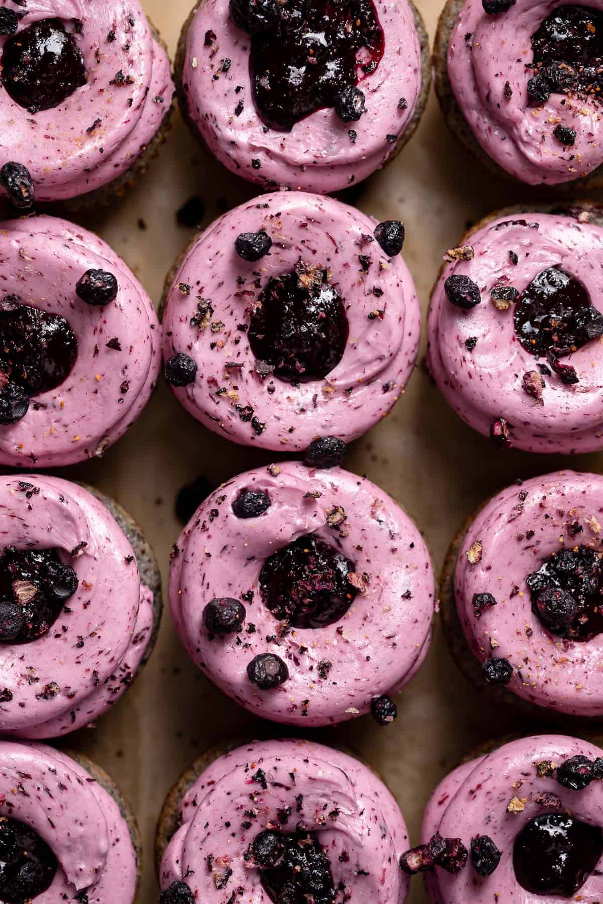 An overhead shot of the tops of the blueberry cupcakes.