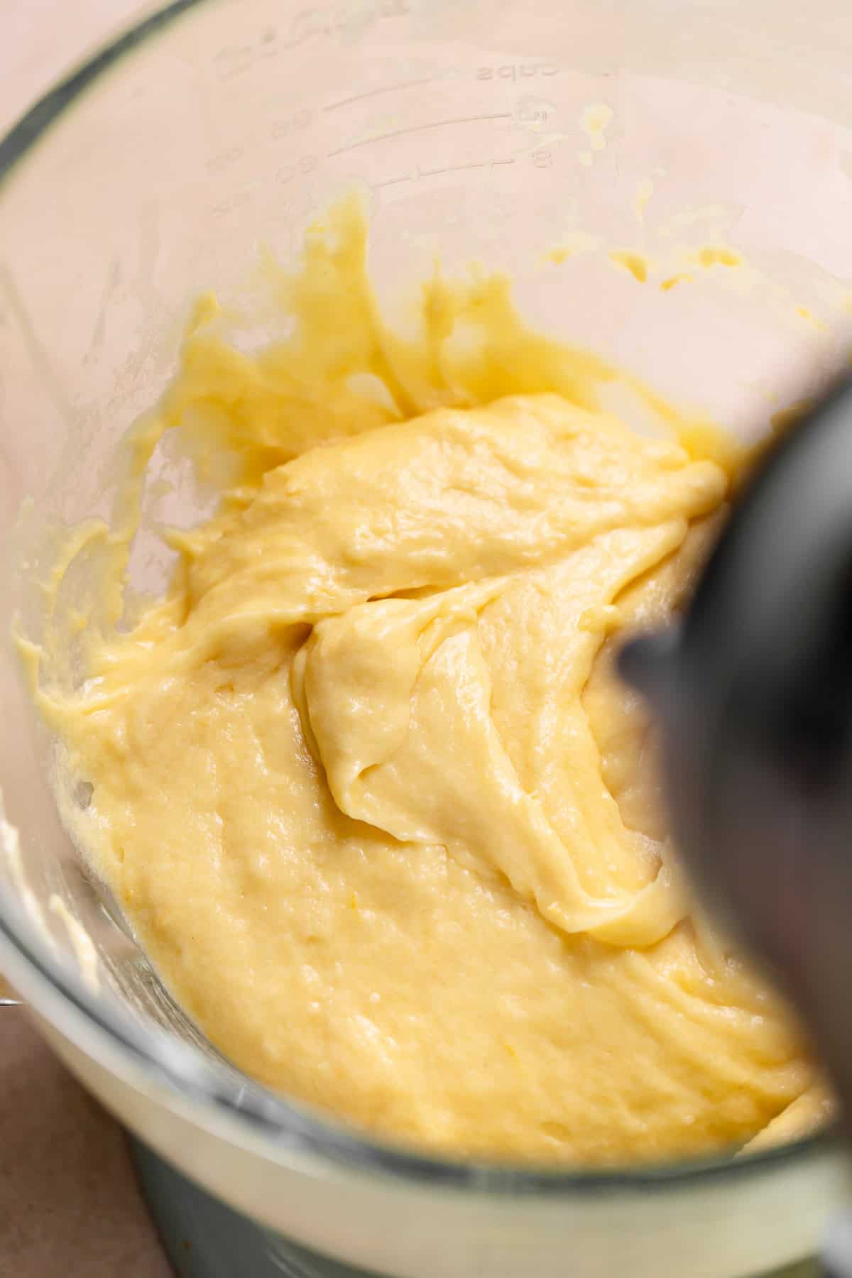 Lemon cake batter in a mixing bowl.