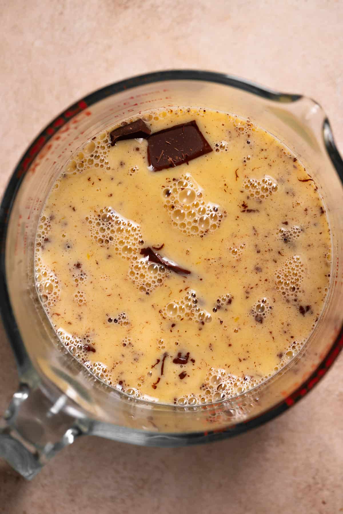 Egg-cream mixture poured over the chopped chocolate to form the ganache.