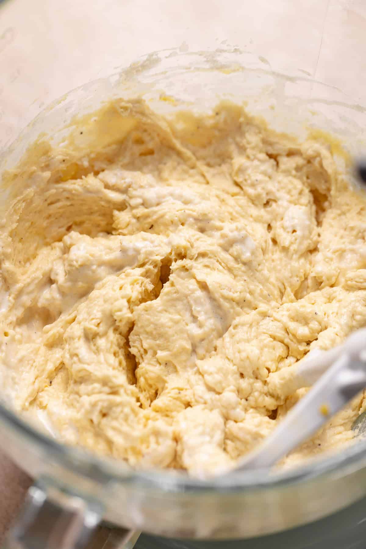The loaf batter in a mixing bowl before adding the blueberries.