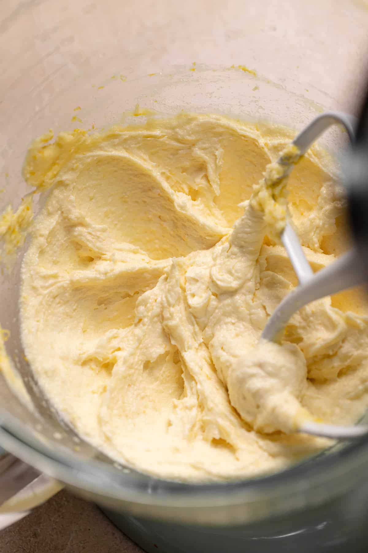 Creamed butter and sugar in a mixing bowl.
