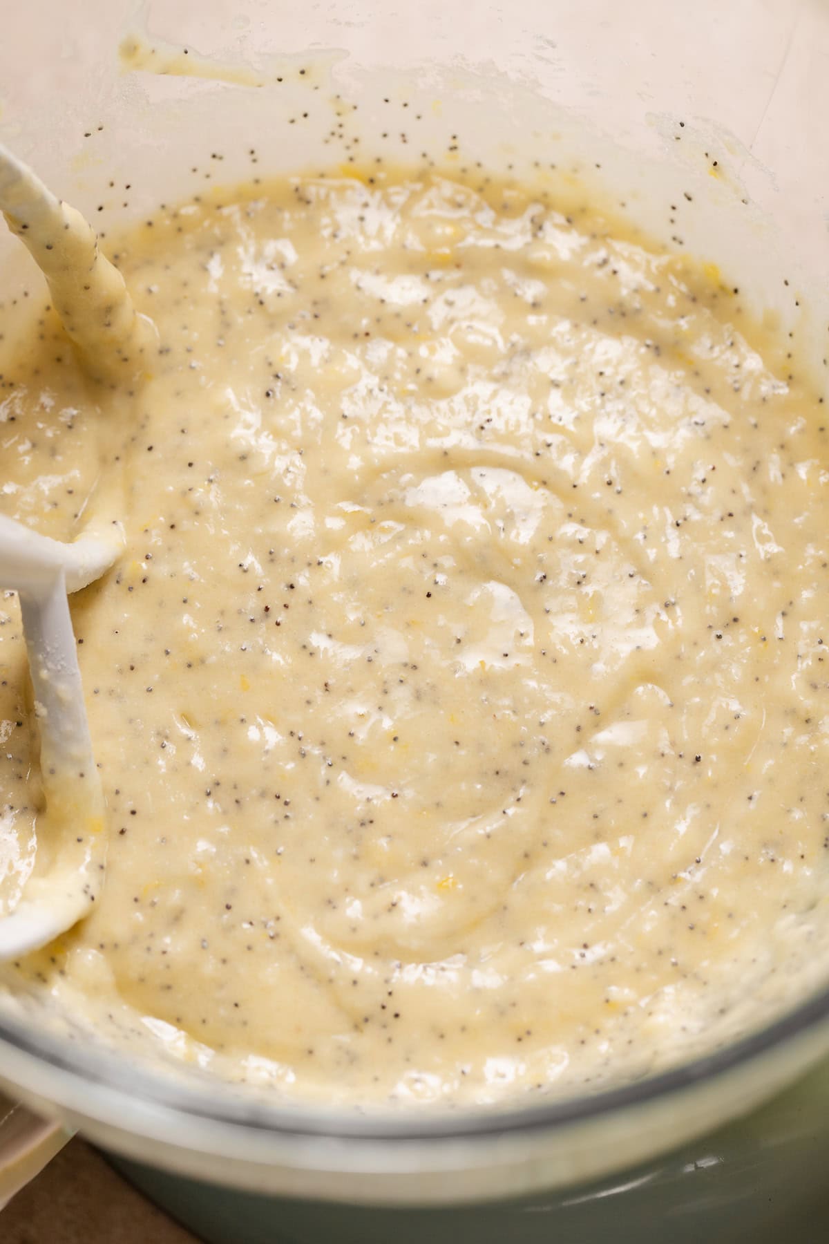 Lemon poppy seed batter in a mixing bowl.