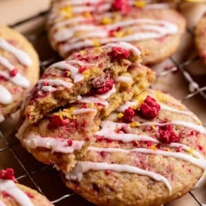 Lemon raspberry cookies cut in half to show the soft chewy centers.