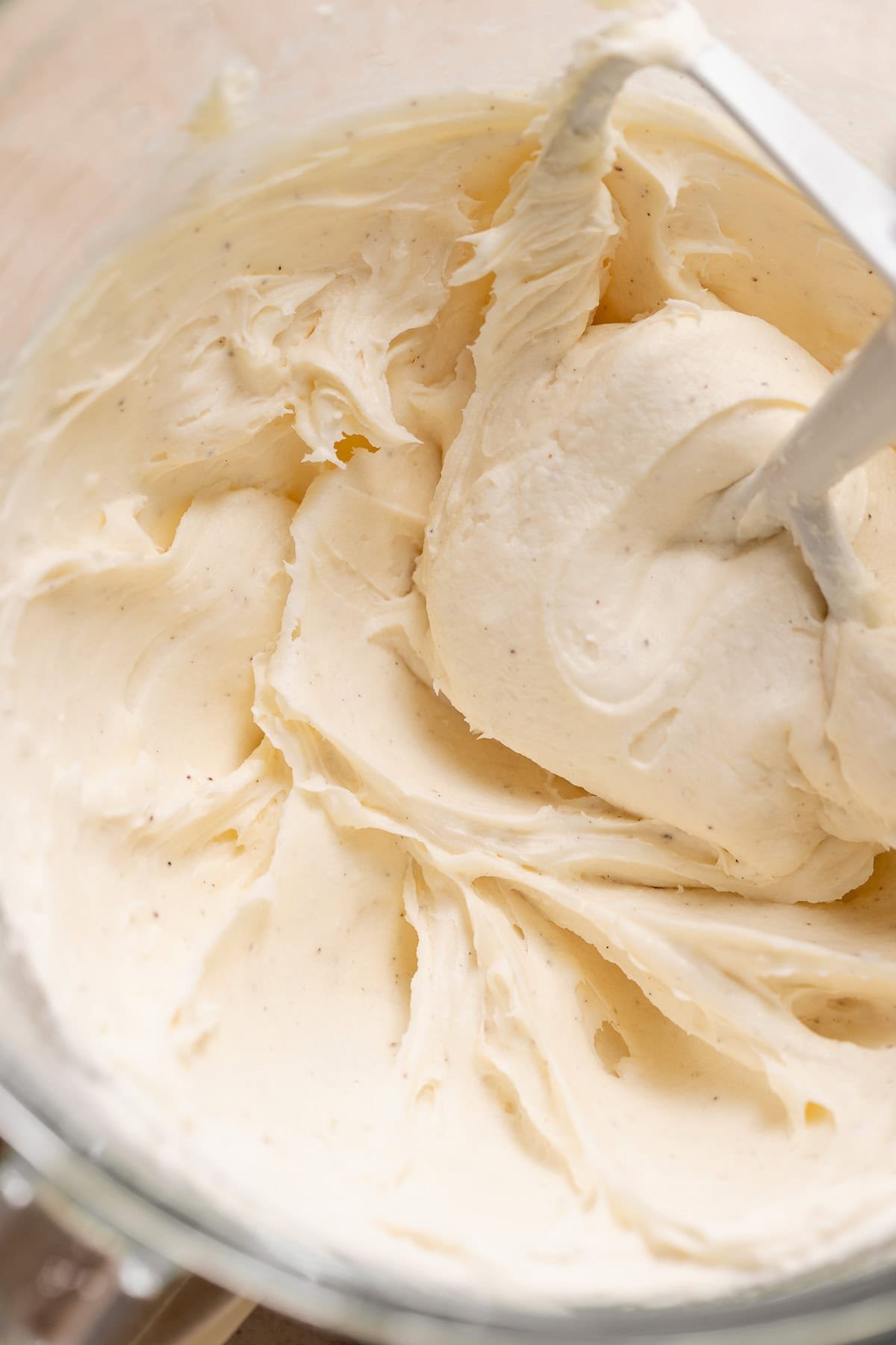 Cream cheese frosting in a mixing bowl.