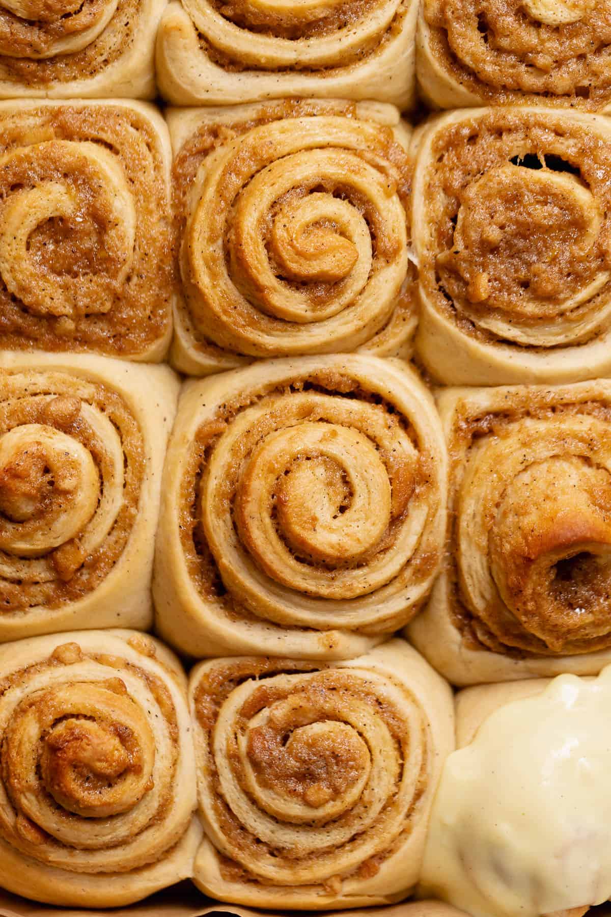 Banana pudding buns with golden brown tops after baking.