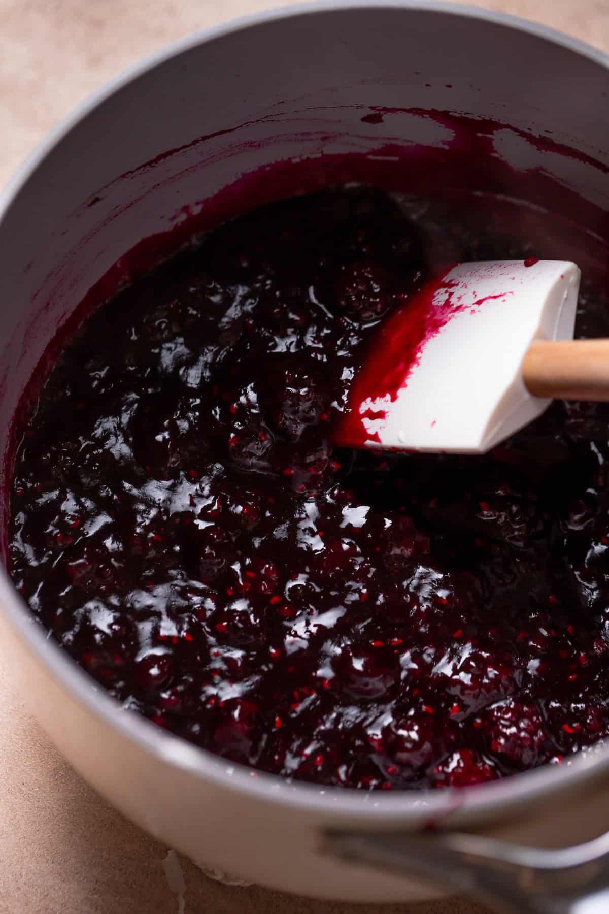 The mixed berry jam in a pot.