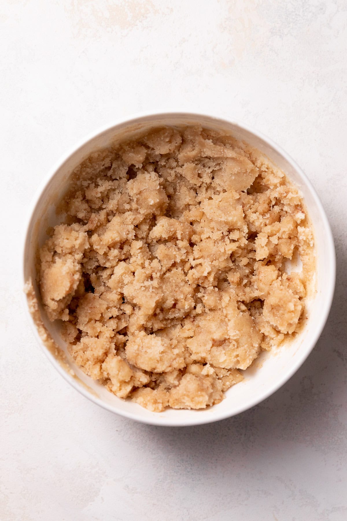 Cinnamon crumb topping in a bowl.