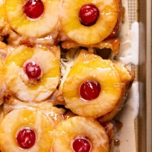 Pineapple rolls on a baking sheet.