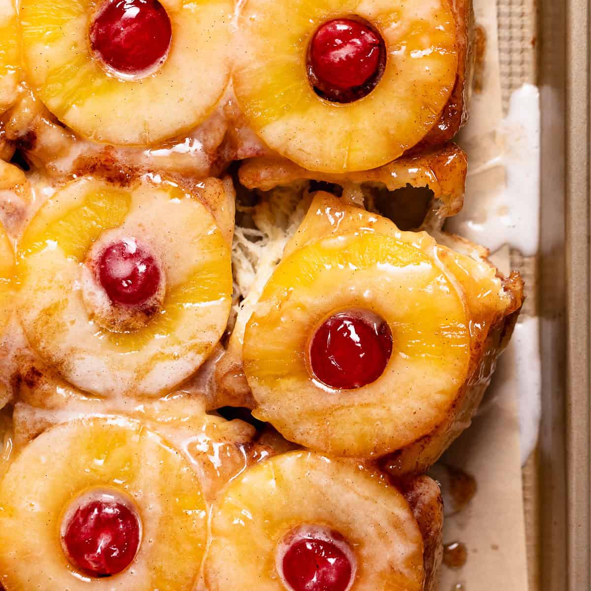 Pineapple rolls on a baking sheet.