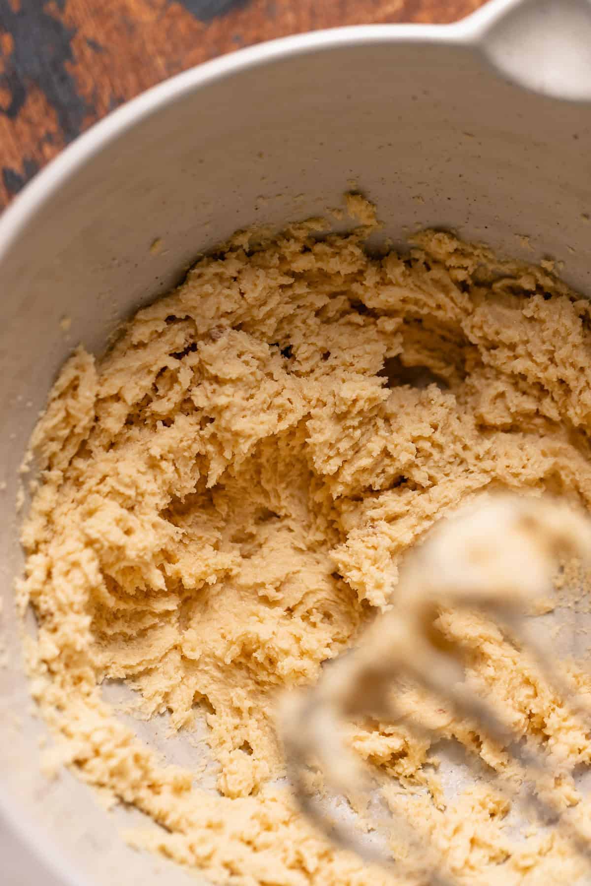 Creamed butter and sugar in a mixing bowl.