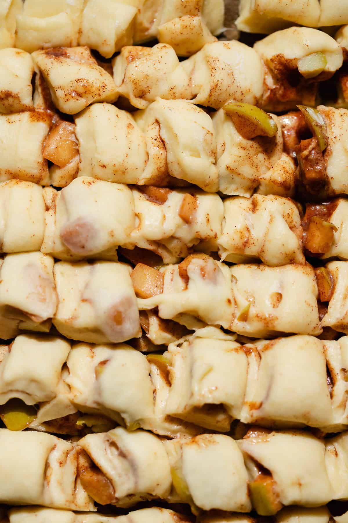 Apple fritter dough cut into one inch pieces.
