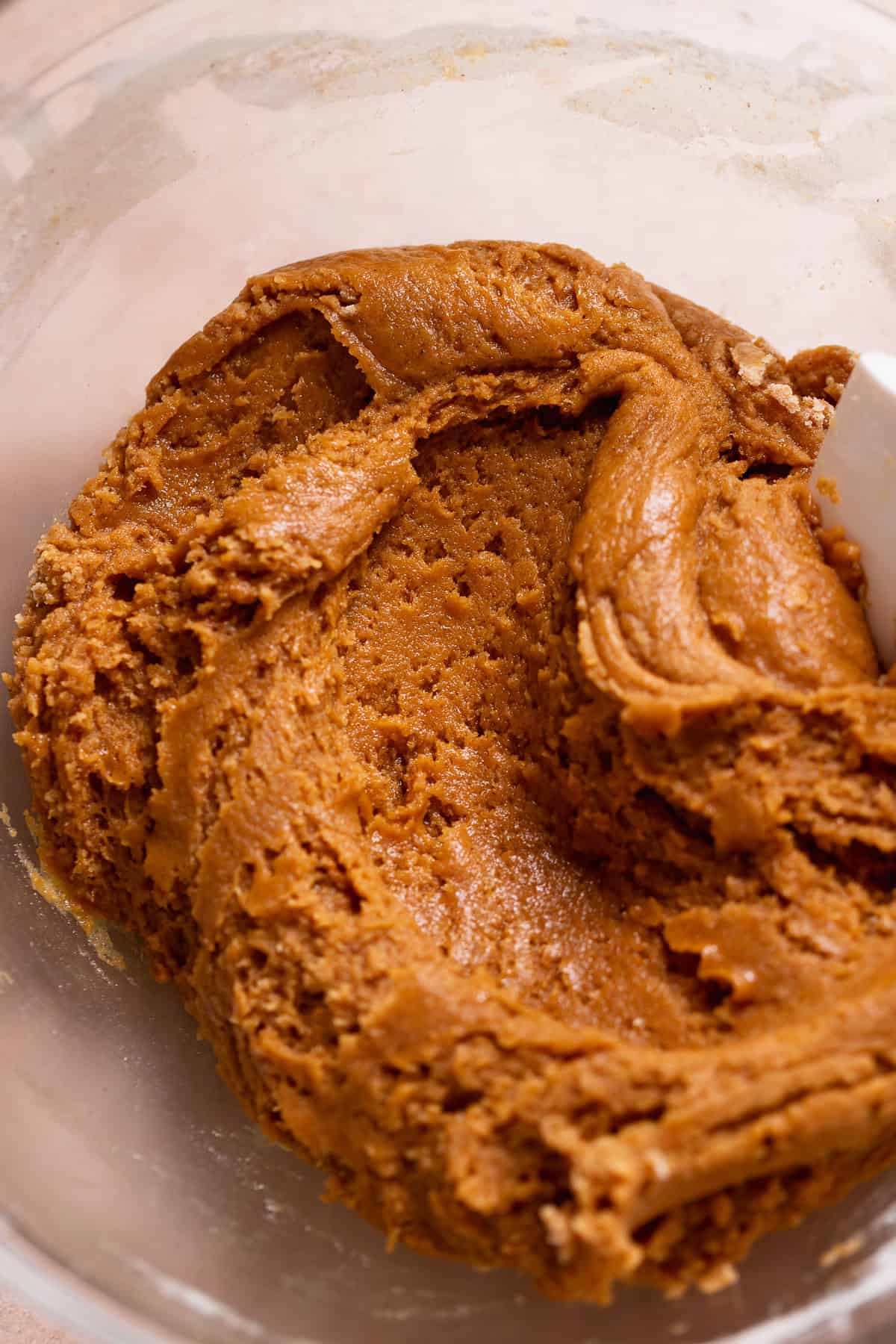 Gingerbread cookie dough in a mixing bowl.