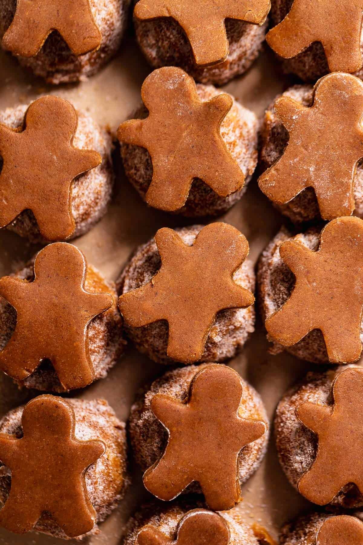 Gingerdoodle cookie dough topped with mini gingerbread cookies.