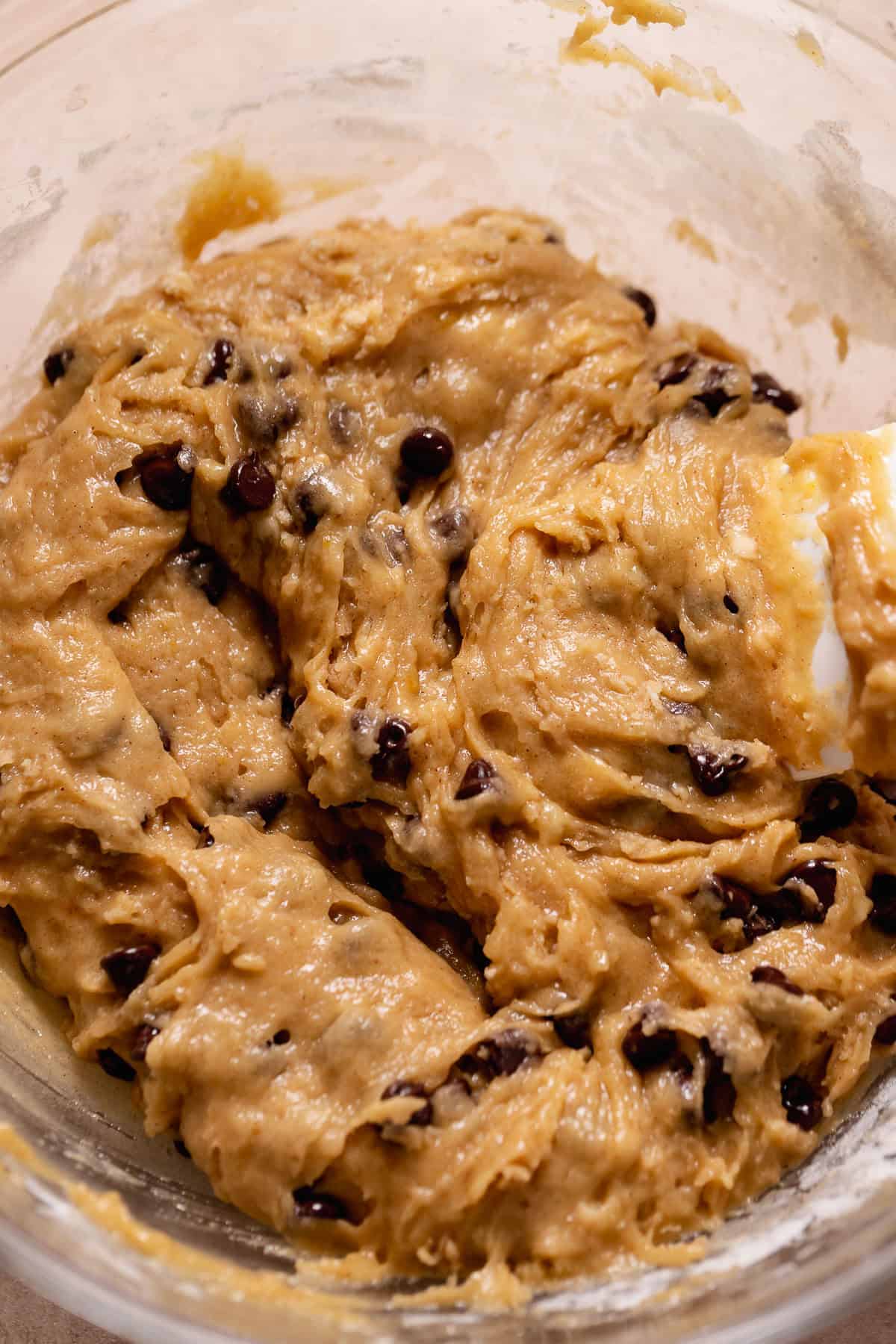 Banana bread chocolate chip cookie dough in mixing bowl.