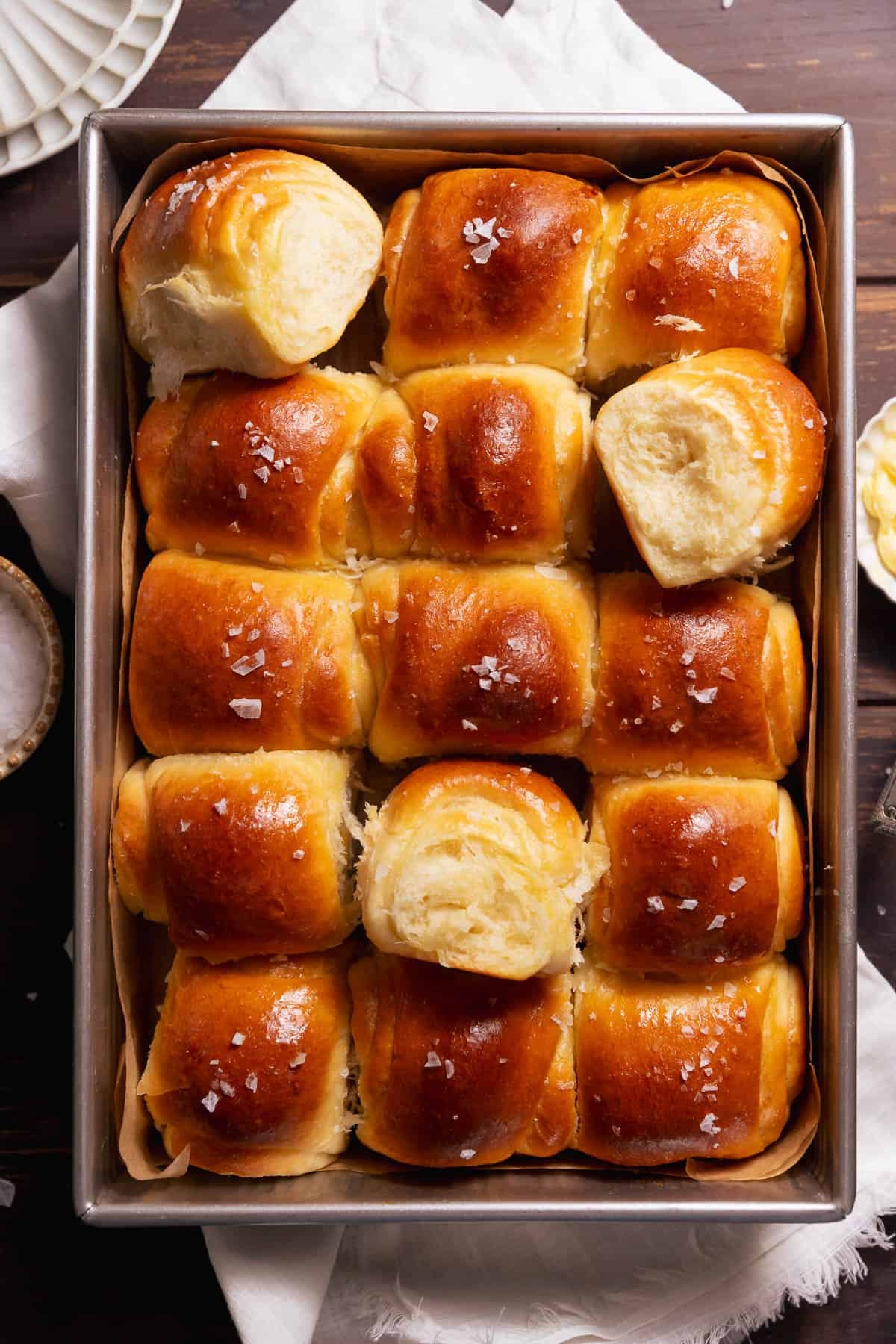Close-up of a soft fluffy dinner roll showing its light airy pull-apart interior.