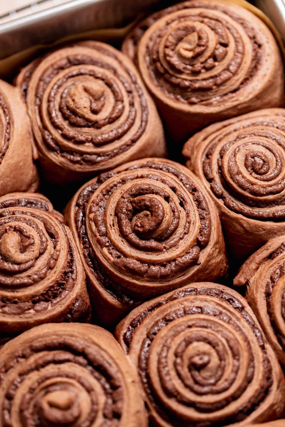 A close up of the baked brownie rolls right after pulling them out of the oven.