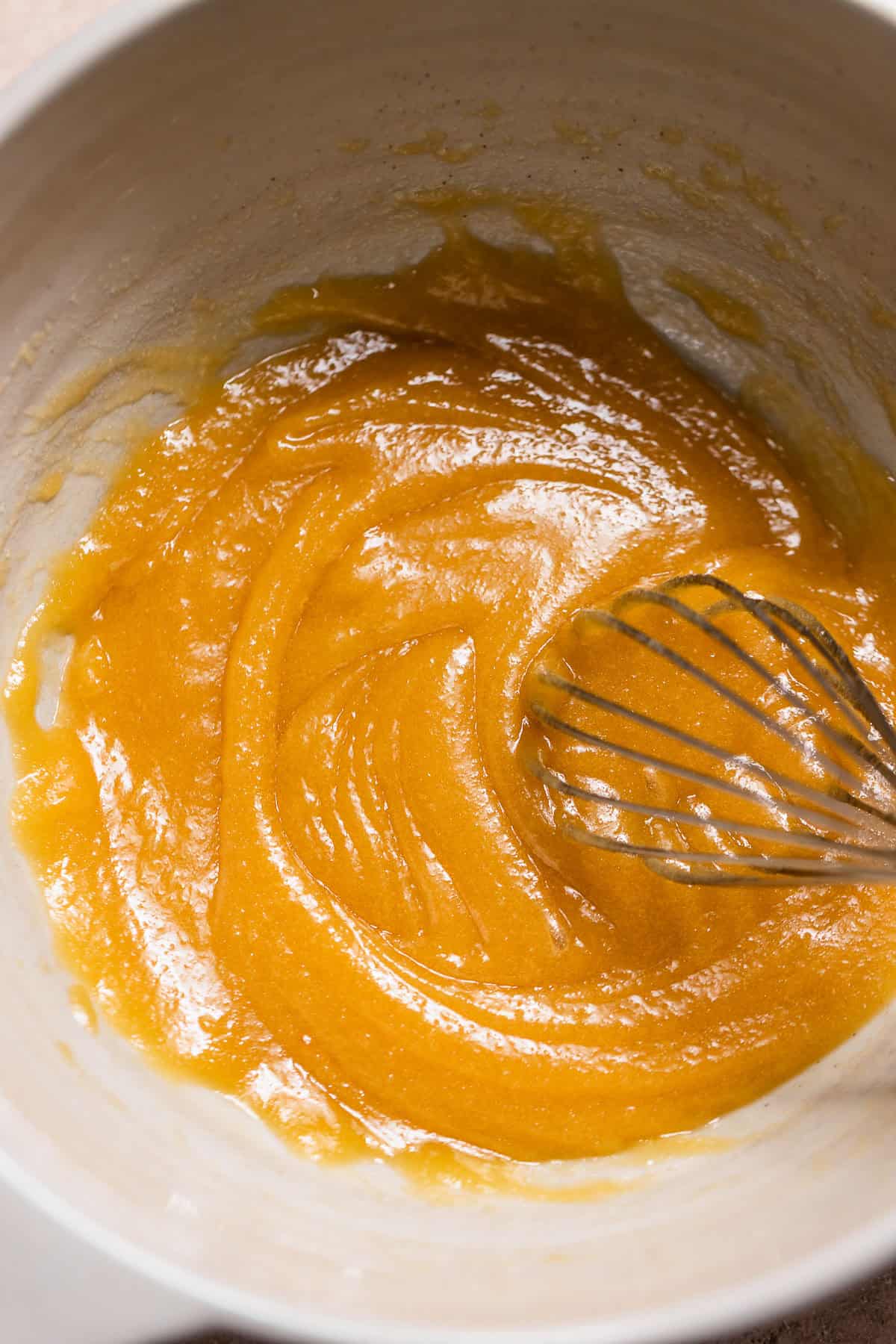 Melted butter whisked with brown sugar and granulated sugar until smooth and emulsified.