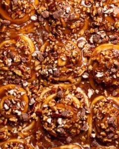 Butter pecan sticky buns covered in thick caramel pecan sauce.
